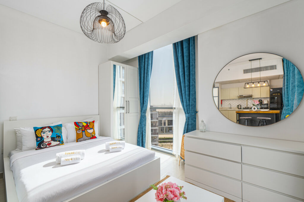 Chic Studio | Balcony with Pool & Skyline Views