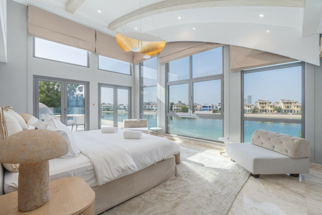 Luxurious Palm Beachfront Living | Stunning 6BR